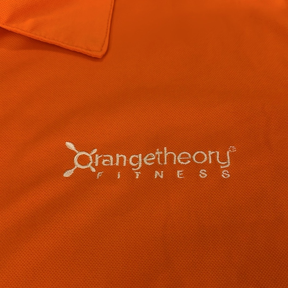 Men’s large Orange Theory polo